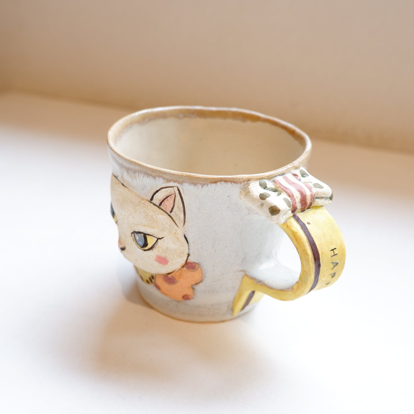 1-1 リボンねこのマグ | 門脇美香江